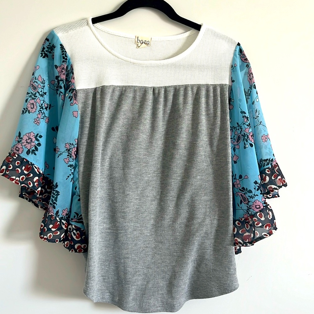 Pancho style formal shirt for woman, goes well with jeans